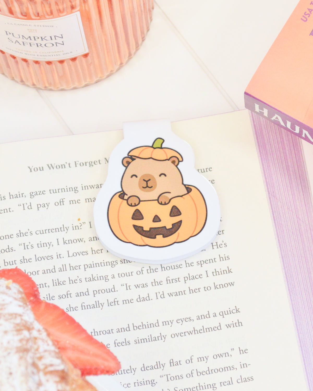 a paper cut out of a pumpkin with a bear on it