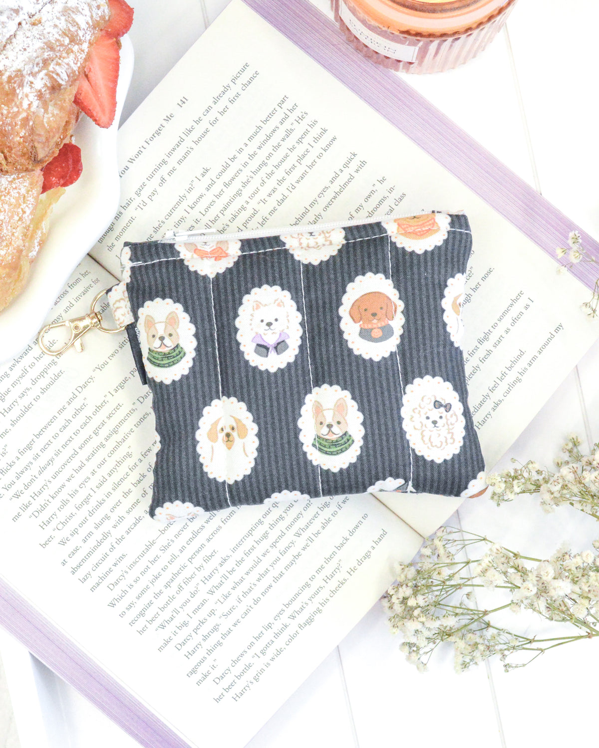 a small pouch on top of a book