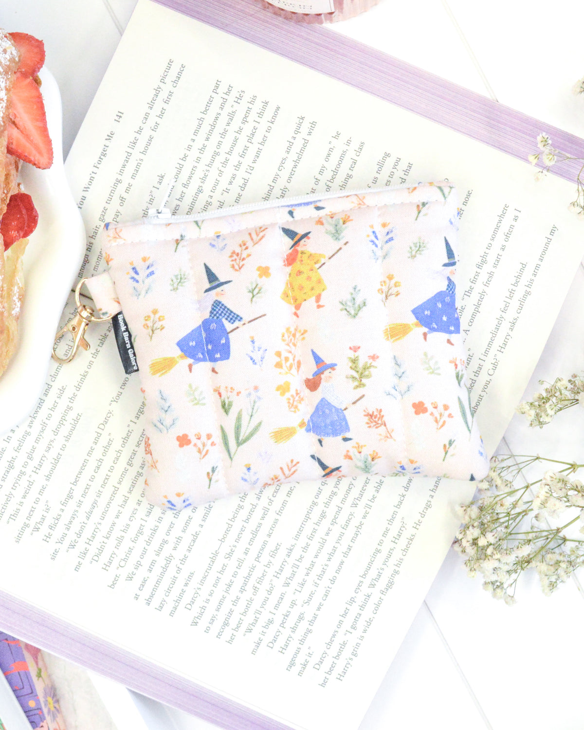 a small purse on top of a book
