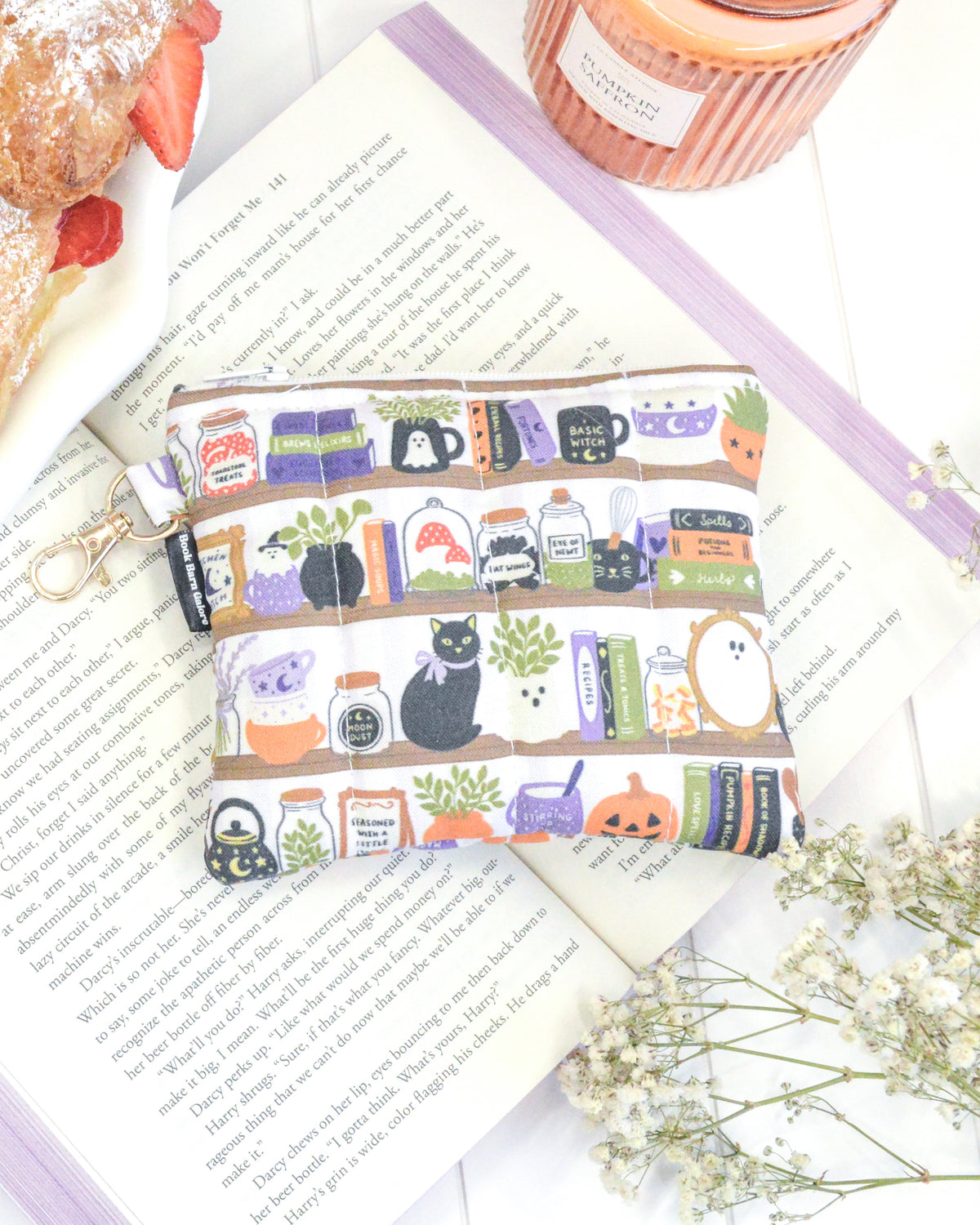 a small pouch on top of a book
