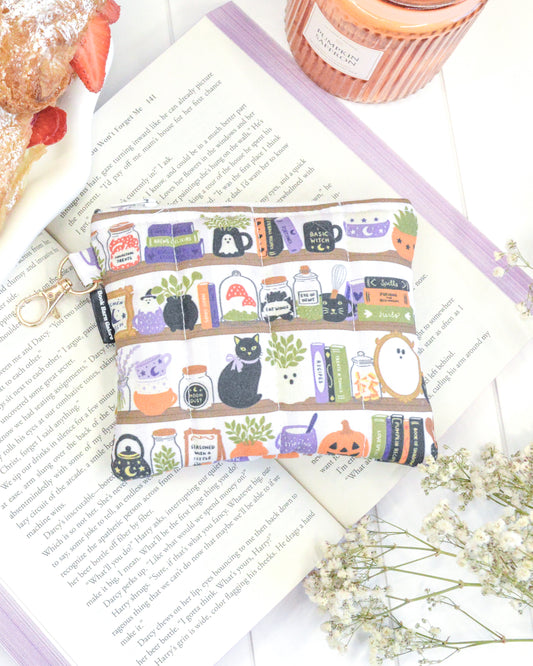 a small pouch on top of a book